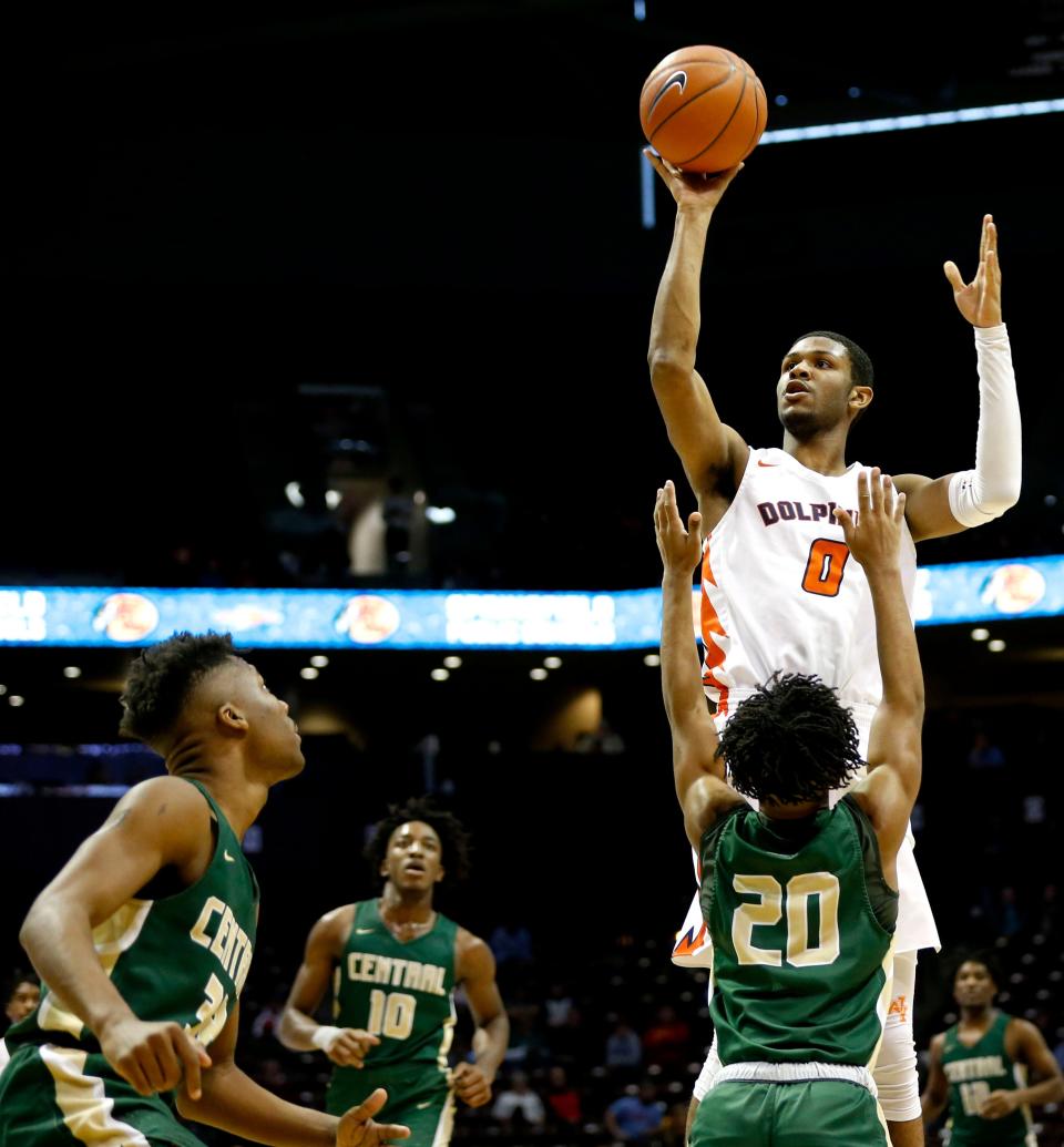 Whitney Young (Chicago) senior AJ Casey shoots a field goal over New Madrid County Central (Mo.) sophomore Aj Ruff in the first round of the Bass Pro Shops Tournament of Champions at JQH Arena on Thursday, Jan. 13, 2022, 