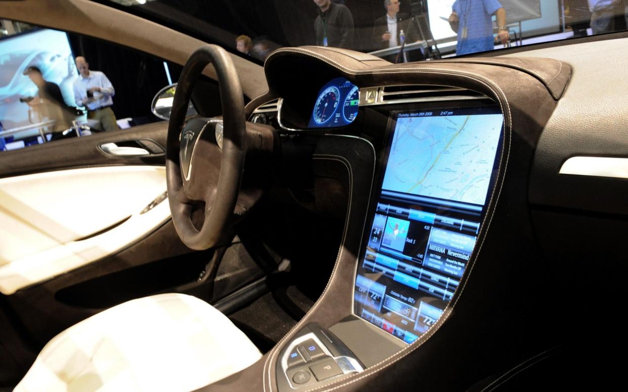 The touch-screen control panel of the new Tesla Model S all-electric sedan - AFP