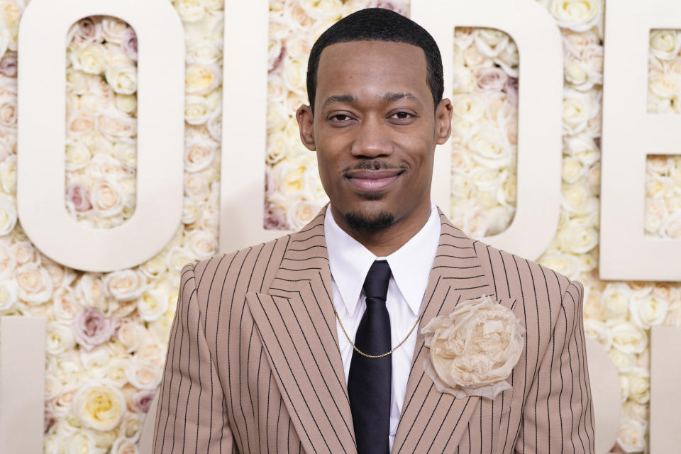 Tyler James Williams arrives at the 81st Golden Globe Awards on Sunday, Jan. 7, 2024, at the Beverly Hilton in Beverly Hills, Calif. (Photo by Jordan Strauss/Invision/AP)