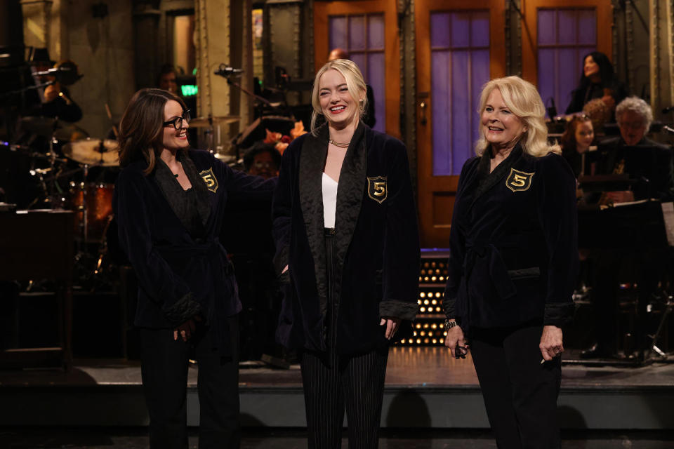 Surprise guest Tina Fey, host Emma Stone, and Candice Bergen during the Monologue on Saturday, December 2, 2023. (Will Heath / NBC)