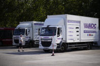 Instructor Graham Bolger directs learner truck driver Cadhene Lubin-Hewitt as he reverses at the National Driving Centre in Croydon, south London, Wednesday, Sept. 22, 2021. Lubin-Hewitt, 32, moved to the UK when he was 16 from Trinidad and Tobago and has been driving buses and coaches for about 10 years. Britain doesn't have enough truck drivers. The shortage is contributing to scarcity of everything from McDonald's milkshakes to supermarket produce. (AP Photo/Matt Dunham)