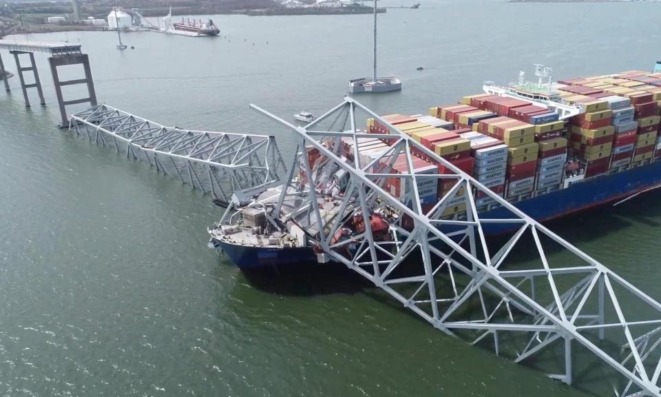 <span>The bridge collapsed on Tuesday after a container ship hit one of its concrete columns.</span><span>Photograph: EyePress News/Rex/Shutterstock</span>