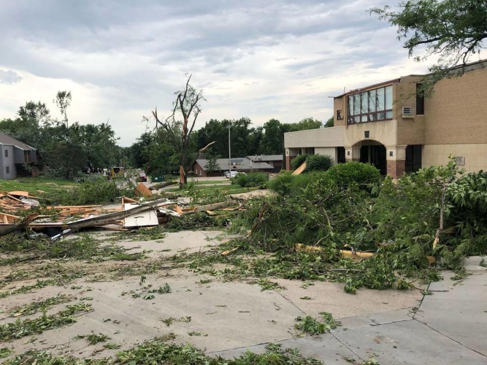 The Kappa Alpha Theta (pictured above) and Chi Omega houses east of the Kansas State University campus were two of five buildings authorities declared condemned and unsafe to occupy Saturday evening after storms tracked through Manhattan, Kansas. Both sorority houses were unoccupied. Three single-family homes in the neighborhood on McClain Lane were also severely damaged.