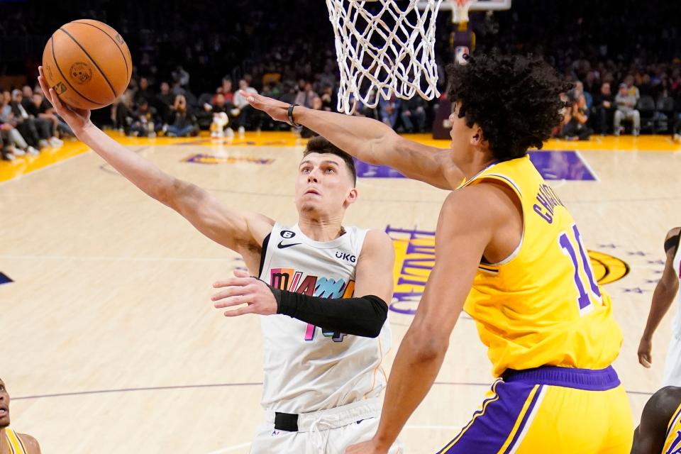 Tyler Herro, left, is averaging 21.2 points per game for the Miami Heat this season.