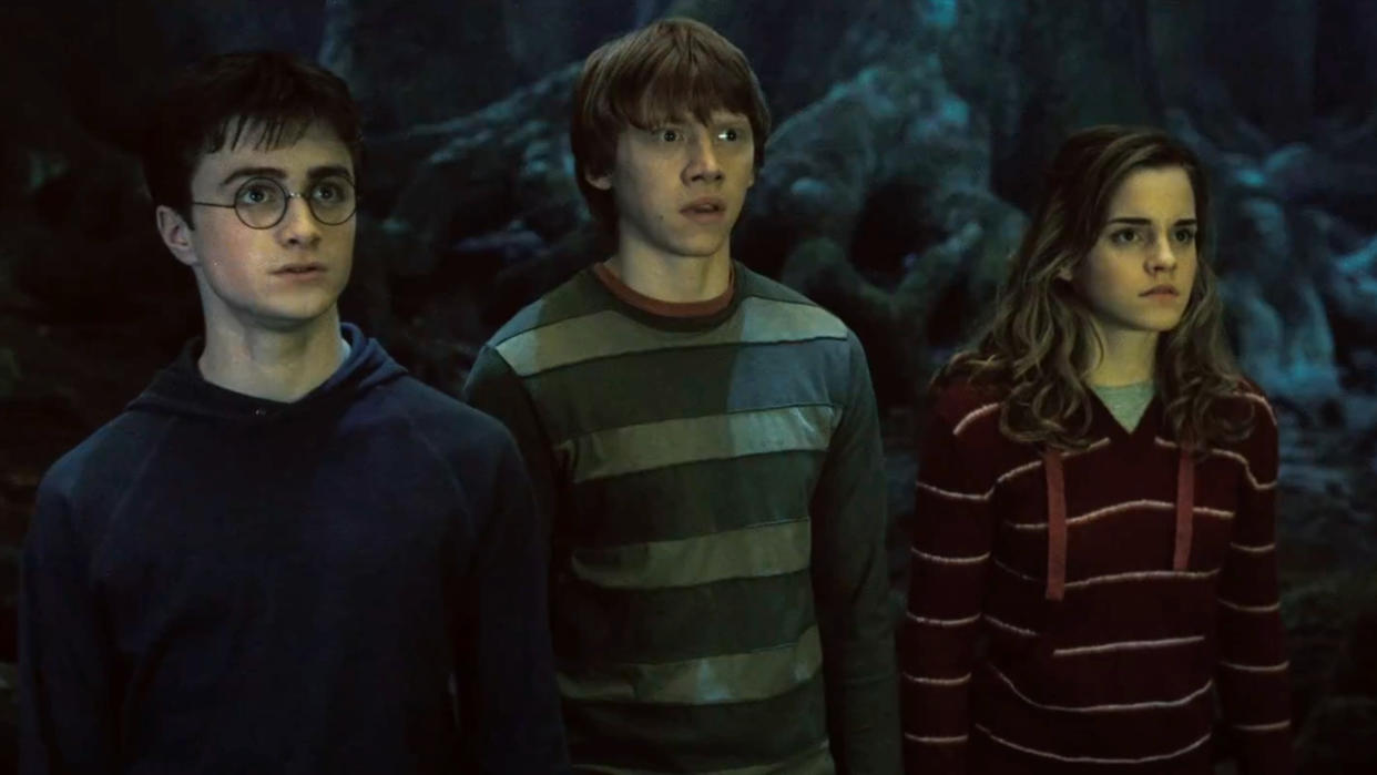  Daniel Radcliffe, Rupert Grint, and Emma Watson stand stunned in the Forbidden Forest in Harry Potter and the Order of the Phoenix. 