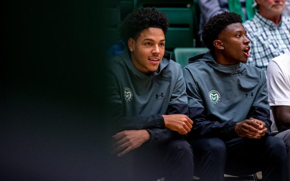 Colorado State guards Josiah Strong, left, and Isaiah Stevens, right, encourage teammates from the bench against Gardner-Webb at Moby Arena on Monday Nov. 7, 2022.