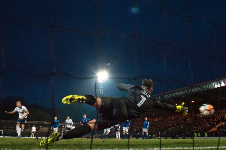 Paying the penalty: Tottenham's Harry Kane scores the second goal from the penalty spot