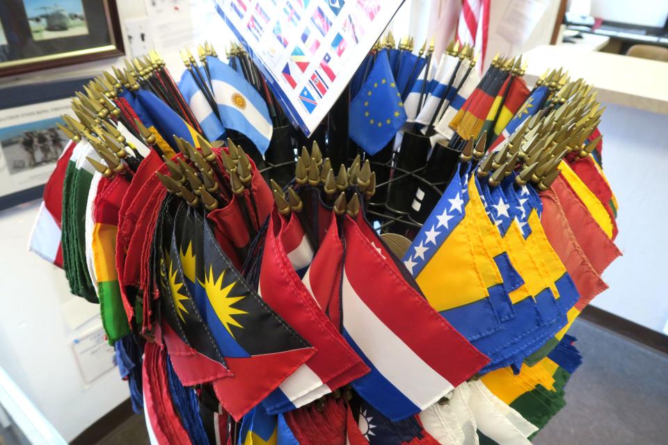 Small international flags for sale at East Coast Flag & Flagpole in Beachwood Monday, October 24, 2022.  The 26-year-old shop owned by Jim Kuhl on Route 9 provides flags, flagpoles, installation, and service.