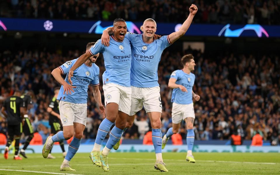 Manuel Akanji celebrates with Erling Haaland - Getty Images/Michael Regan