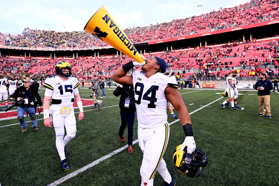 COLUMBUS, OHIO - NOVEMBER 26: Kris Jenkins #94 of the Michigan Wolverines celebrates a 45-23 victory over the Ohio State Buckeyes at Ohio Stadium on November 26, 2022 in Columbus, Ohio. (Photo by Ben Jackson/Getty Images)