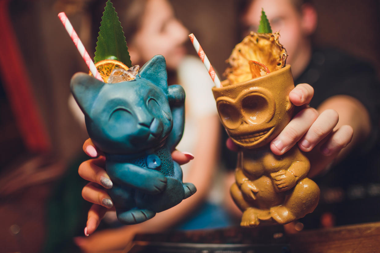 What is a tiki mug? The artists who craft the ceramic cocktail glasses say they're there to help further the theatrical tiki story. (Photo: Getty Creative)