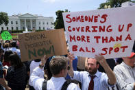 <p>About 300 people rally to protest against President Donald Trump’s firing of Federal Bureau of Investigation Director James Comey outside the White House May 10, 2017 in Washington, DC. Angry over the firing of Comey, the demonstrators demanded that an independent special prosecutor investigate possible ties between the Trump campaign and Russian officials. (Chip Somodevilla/Getty Images) </p>