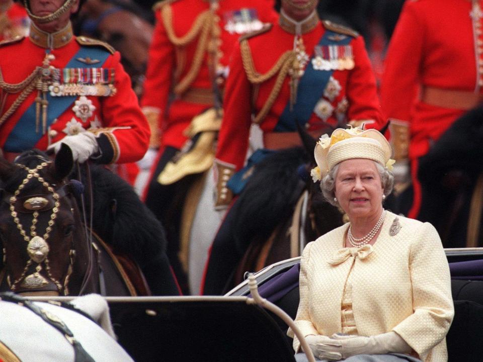 Queen Elizabeth wearing yellow to Trooping the Colour in 1997