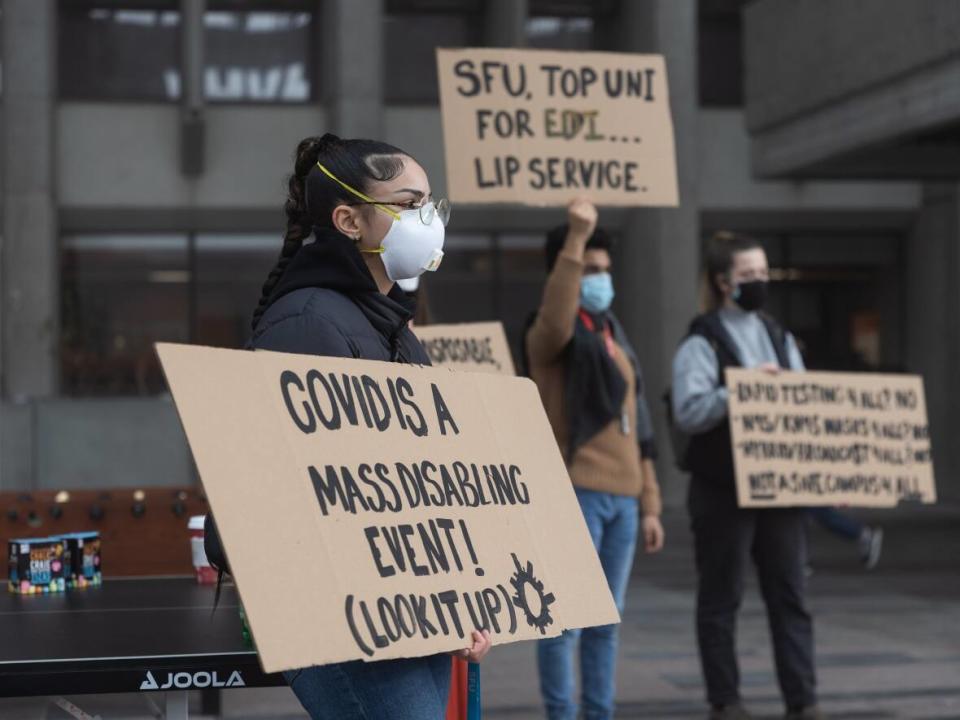 Simon Fraser University students hold a rally in protest of the university's return-to-campus plans on Monday, Jan. 24, 2022. (Gian Paolo Mendoza/CBC - image credit)