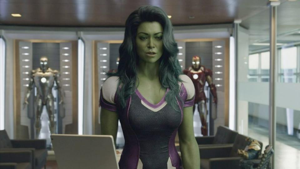 she hulk stands in front of counter at marvel studios to meet kevin, the show's Kevin Feige Cameo.