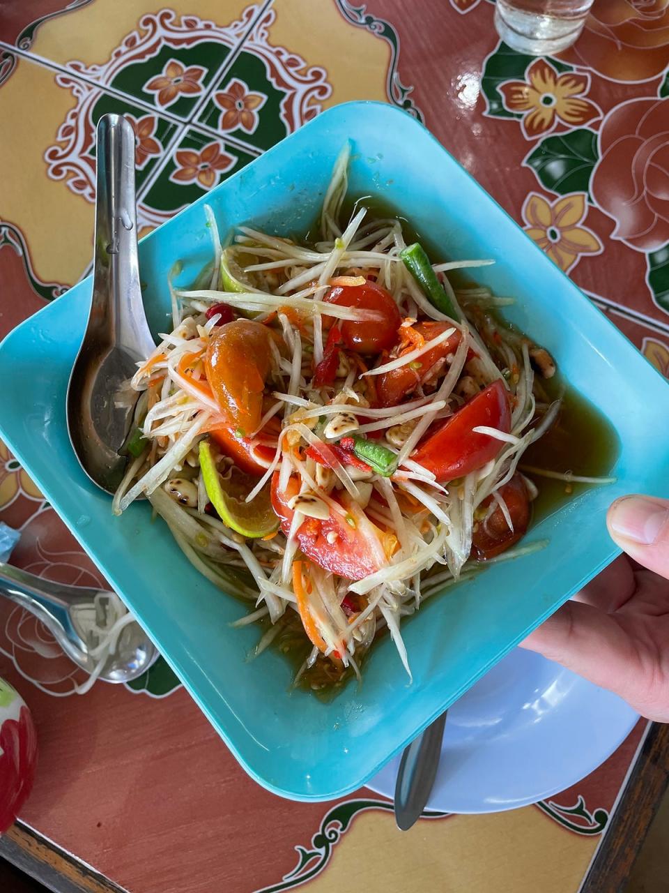 It’s traditional to add one bird’s eye chilli for every year of your life to your som tam, Thailand’s green papaya salad (Hannah Twiggs)