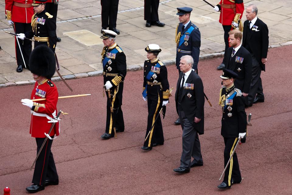 From left, King Charles, Princess Anne, Prince Andrew and Prince Edward, with Prince William and Prince Harry behind them, in procession during the state funeral Queen Elizabeth II at Windsor Castle on Sept. 19, 2022 in Windsor.
