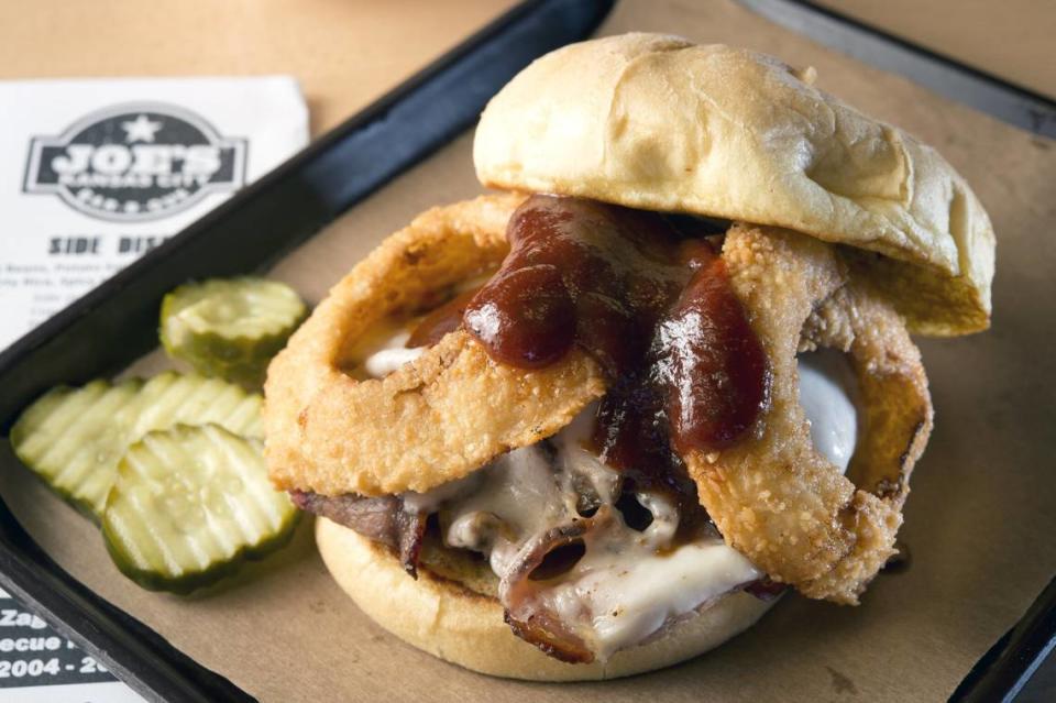 Joe’s Kansas City Bar-B-Que’s famous Z-Man sandwiches feature slow-smoked beef brisket, smoked provolone cheese and onion rings on a toasted kaiser roll. File photo.