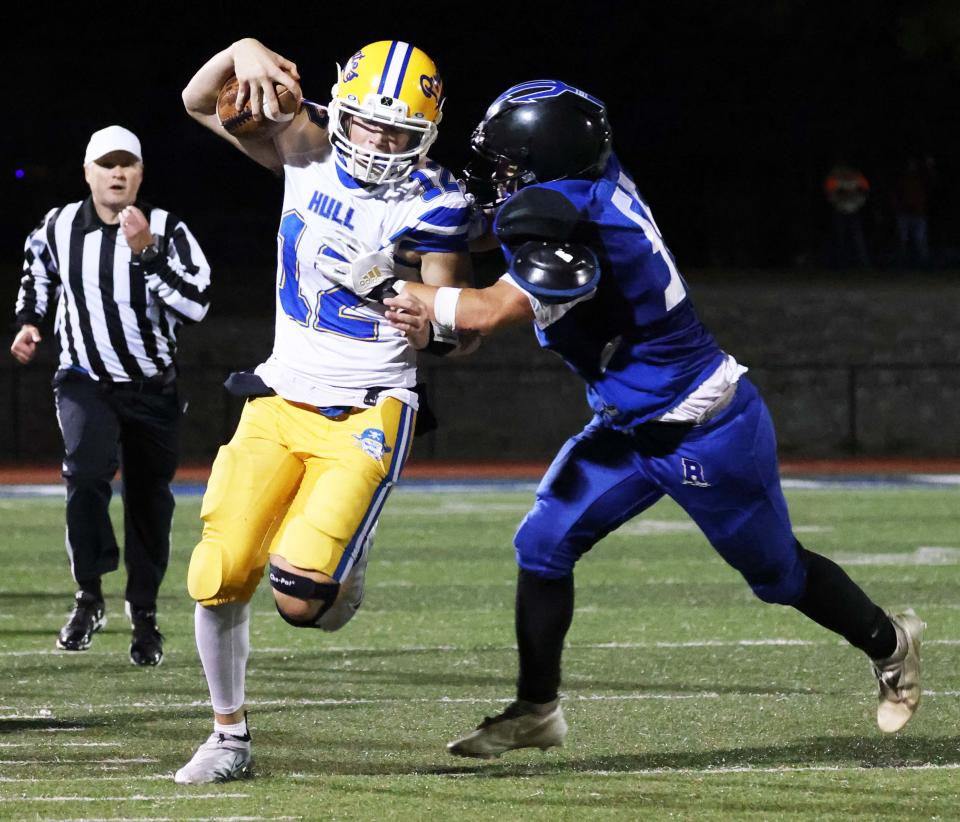 Hull quarterback Luke Richardson carries the football during a game versus Randolph on Friday, Sept. 30, 2022.