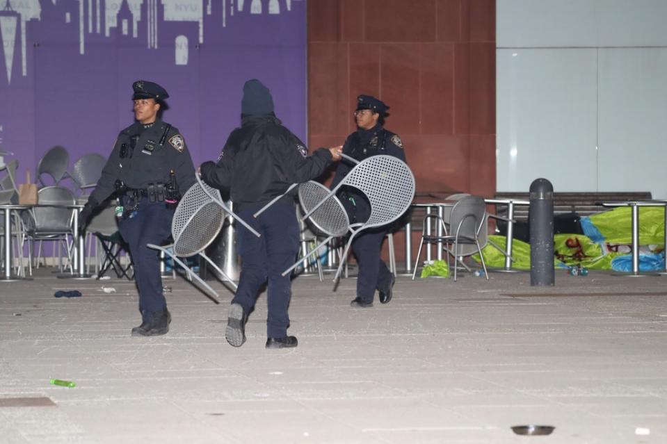 NYPD officers were pelted with trash after they raided an anti-Israel rally at NYU. William C Lopez/New York Post