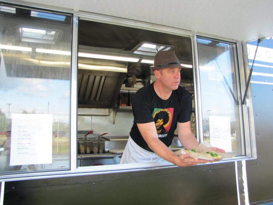 Taco Reho chef and owner Billy Lucas in the original Taco Reho food truck in 2014, the year it opened. He now has two brick-and-mortar locations in Rehoboth Beach and Middletown.