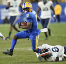 Pittsburgh wide receiver Jordan Addison (3) evades Virginia cornerback Darrius Bratton (8) after making a catchy and takes it all the way for a touchdown during the second half of an NCAA college football game Saturday, Nov. 20, 2021, in Pittsburgh. Pittsburgh won 48-38. (AP Photo/Keith Srakocic)