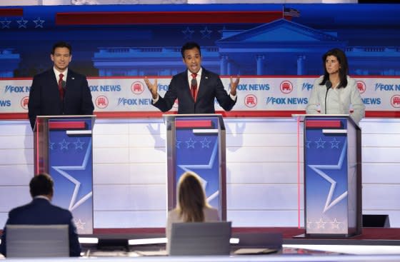 Republican presidential candidates Florida Gov. Ron DeSantis, Vivek Ramaswamy and former U.N. Ambassador Nikki Haley participate in the first debate of the GOP primary season in Milwaukee.<span class="copyright">Win McNamee—Getty Images</span>