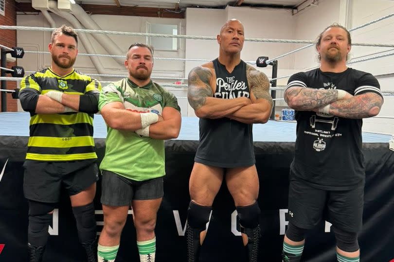 The Rock was pictured alongside the trio of Glasgow wrestlers
