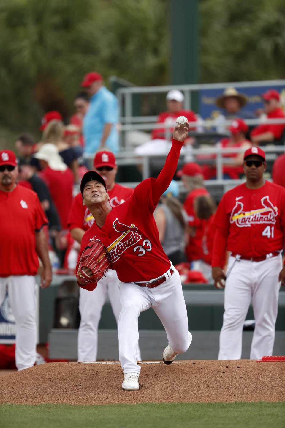 St. Louis Cardinals pitcher Kwang-Hyun Kim warms up before the start of a spring training baseball game against the Miami Marlins Wednesday, Feb. 26, 2020, in Jupiter, Fla. (AP Photo/Jeff Roberson)