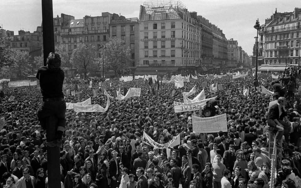 Students and workers demonstrate between Republique and Denfert Rochereau squares on May 13, 1968 - AFP