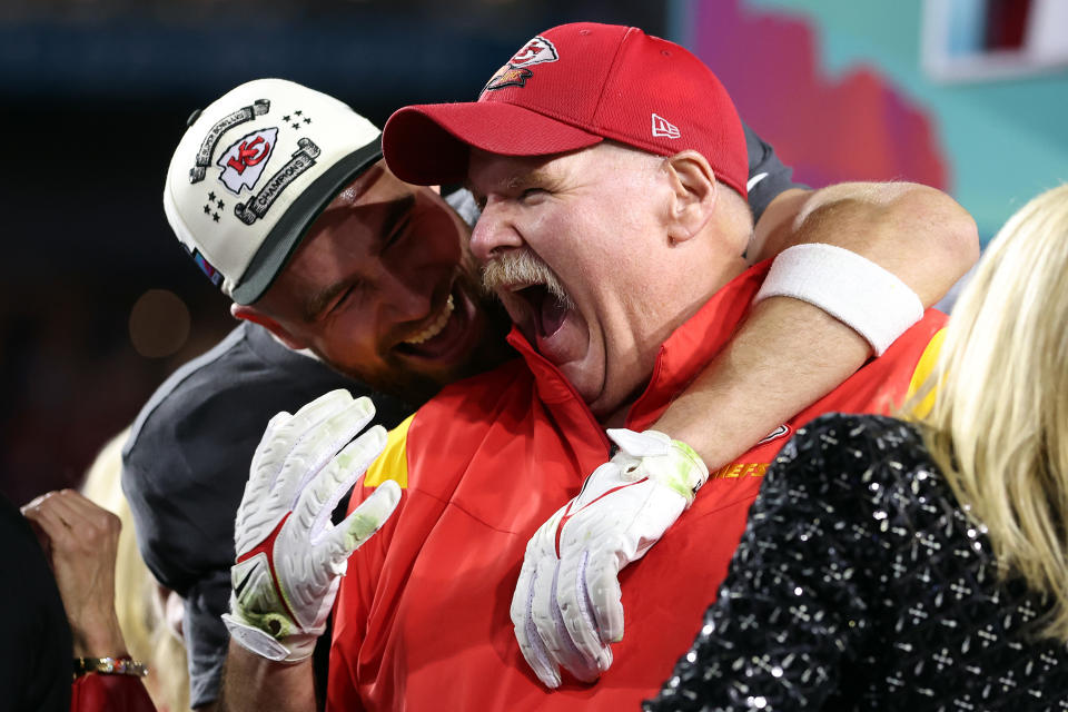GLENDALE, ARIZONA - FEBRUARY 12: Travis Kelce #87 and head coach Andy Reid of the Kansas City Chiefs celebrate after defeating the Philadelphia Eagles 38-35 in Super Bowl LVII at State Farm Stadium on February 12, 2023 in Glendale, Arizona. (Photo by Gregory Shamus/Getty Images)