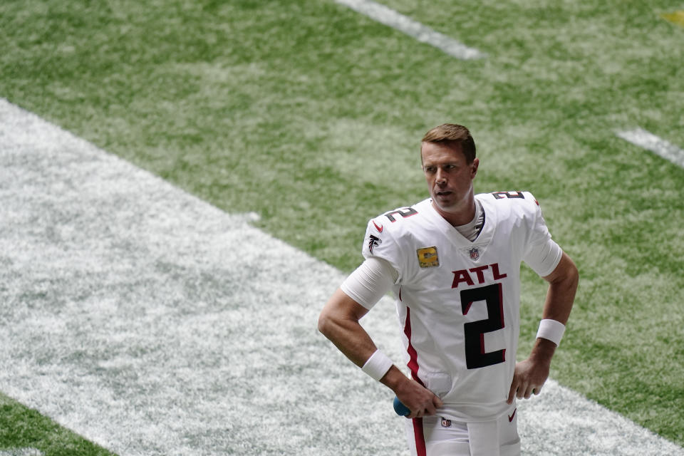 FILE - Atlanta Falcons quarterback Matt Ryan (2) warms up before the first half of an NFL football game between the Atlanta Falcons and the Denver Broncos, Nov. 8, 2020, in Atlanta. Ryan announces his retirement from the NFL on Monday, April 22, 2024. (AP Photo/Brynn Anderson, file)