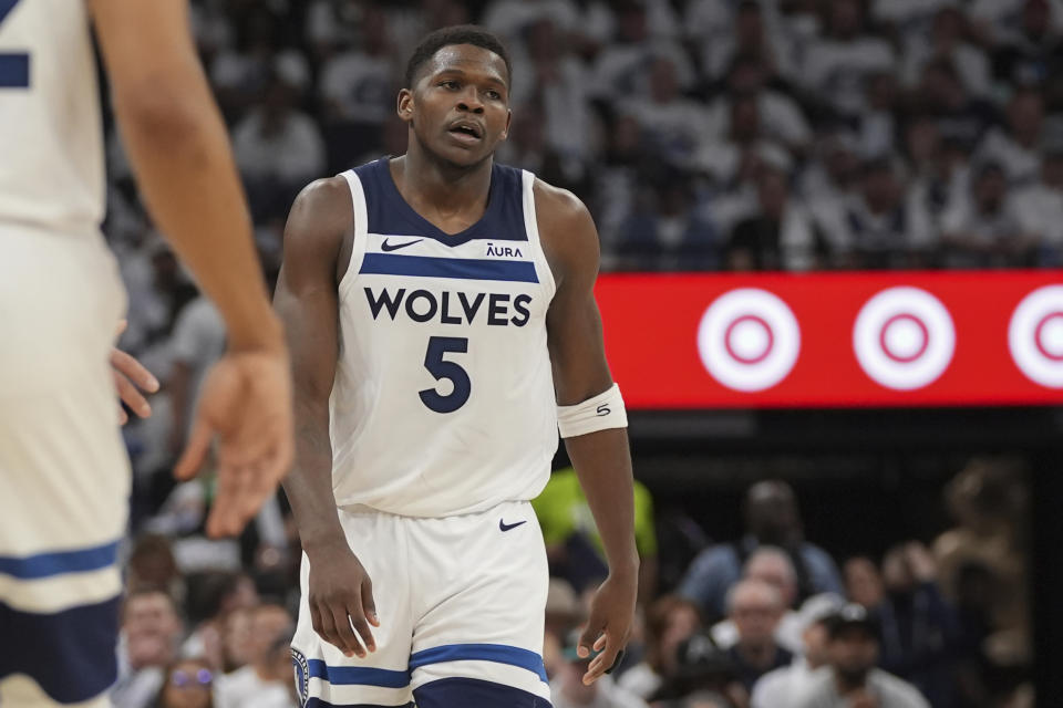 Minnesota Timberwolves guard Anthony Edwards (5) reacts after missing a shot against the Denver Nuggets during the second half of Game 3 of an NBA basketball second-round playoff series Friday, May 10, 2024, in Minneapolis. (AP Photo/Abbie Parr)