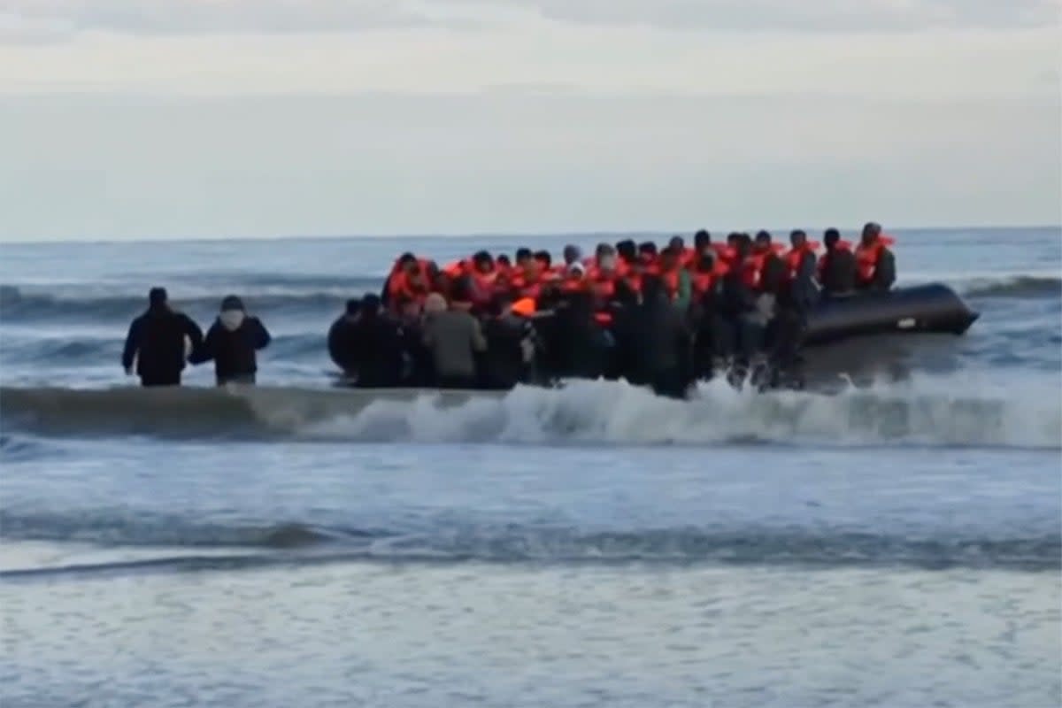 Footage from BBC News shows migrants in small boat at Dunkirk on Tuesday morning after the French coat guard confirmed at least five people had died attempting to cross the English Channel (BBC)