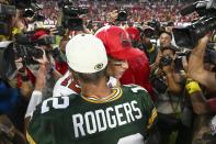 Green Bay Packers' Aaron Rodgers hugs Tampa Bay Buccaneers' Tom Brady after an NFL football game Sunday, Sept. 25, 2022, in Tampa, Fla. The Packers won 14-12. (AP Photo/Jason Behnken)