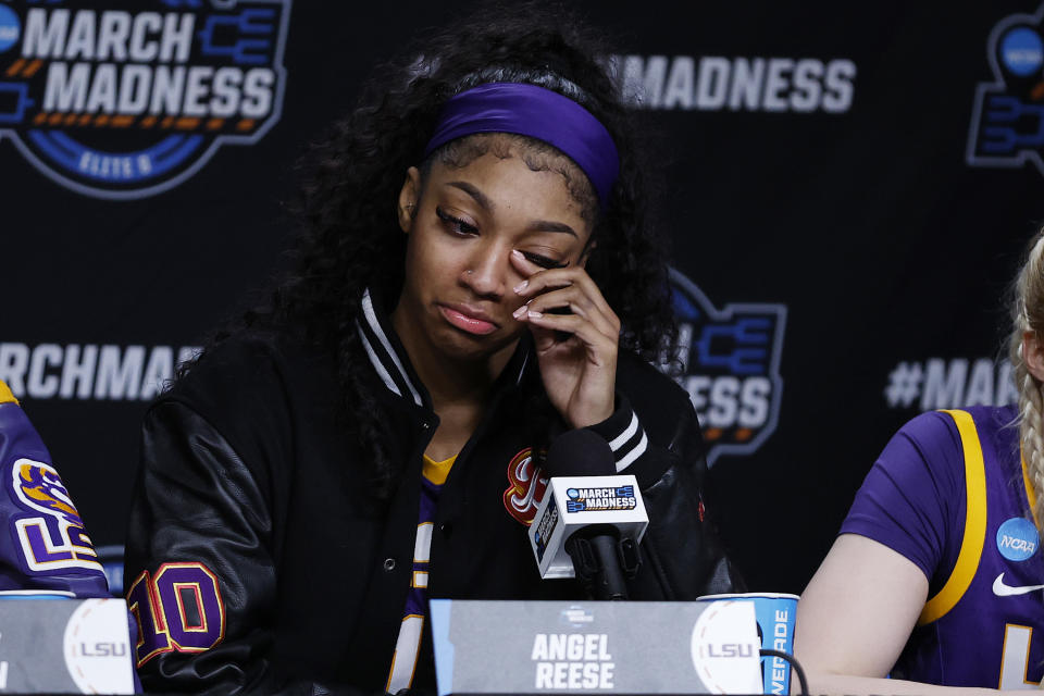 Angel Reese #10 of the LSU Tigers speaks with the media after losing to the Iowa Hawkeyes 94-87 in the Elite 8 round of the NCAA Women’s Basketball Tournament at MVP Arena on April 01, 2024 in Albany, New York.