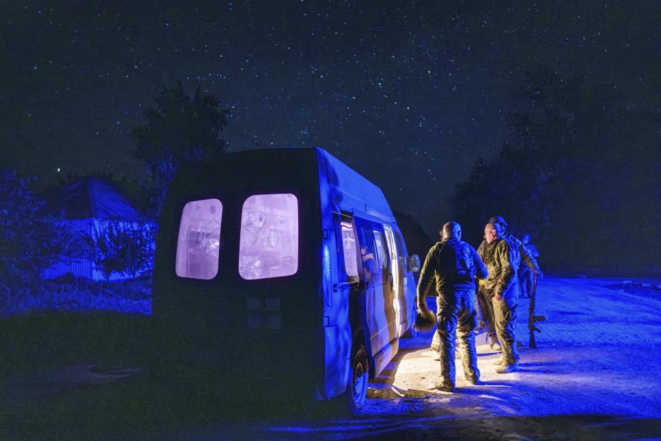 FILE - Ukrainian soldiers who just came from battle stand near an ambulance at a 47th Brigade field hospital near Avdiivka, in Ukraine’s Donetsk region, on Friday, May 10, 2024. (AP Photo/Evgeniy Maloletka, File)