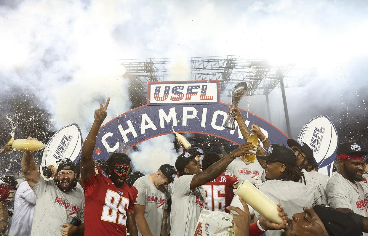 The Birmingham Stallions bathe each other in beer to celebrate after beating the Pittsburgh Maulers for the USFL championship at Tom Benson Hall of Fame Stadium on July 1 in Canton.