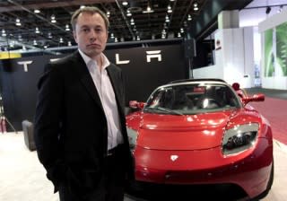 Tesla Motors CEO Elon Musk with Tesla Roadster