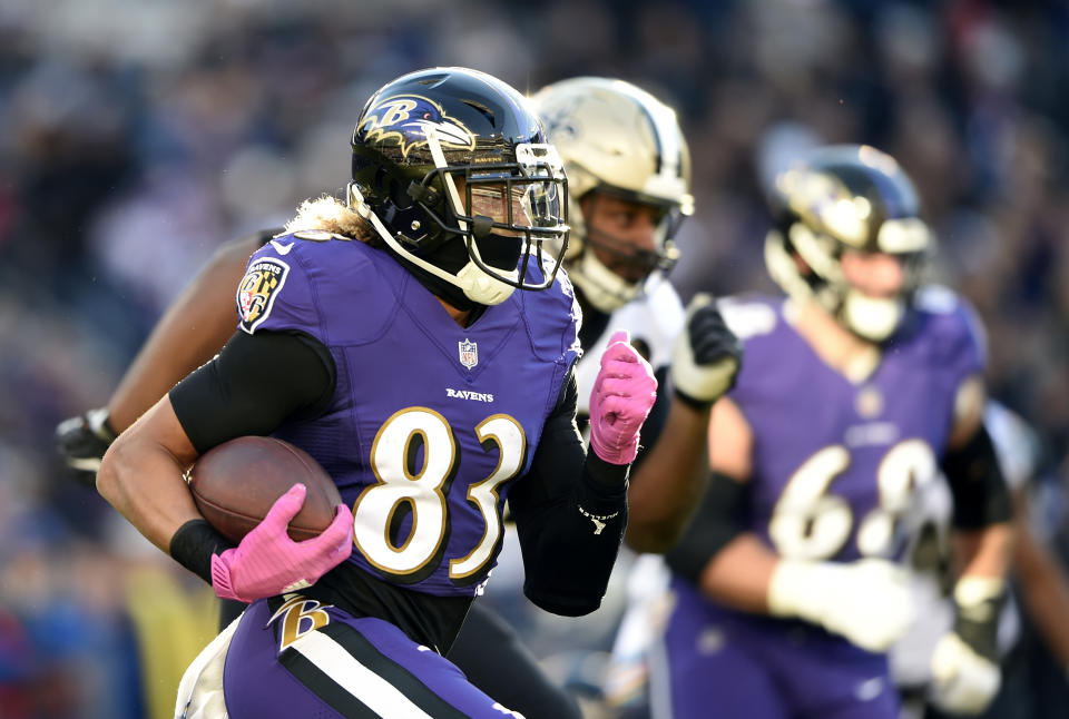 Baltimore Ravens wide receiver Willie Snead (83) rushes the ball in the first half of an NFL football game against the New Orleans Saints, Sunday, Oct. 21, 2018, in Baltimore. (AP Photo/Gail Burton)