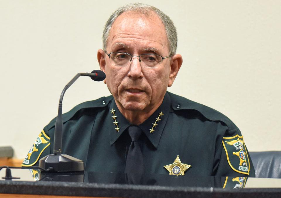 Martin County Sheriff William Snyder glances toward former deputy Steven O'Leary while giving testimony to the judge during O'Leary's sentencing on Thursday, Dec. 2, 2021, at the Martin County Courthouse in Stuart.