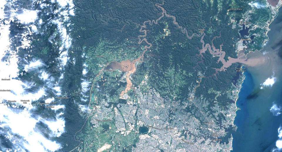 This photo shows the mass amount of land covered in flood water (top left) compared to the Sydney Harbour (bottom right). Source: Twitter/Sentinel-2 via EO Browser, Sinergise Ltd.