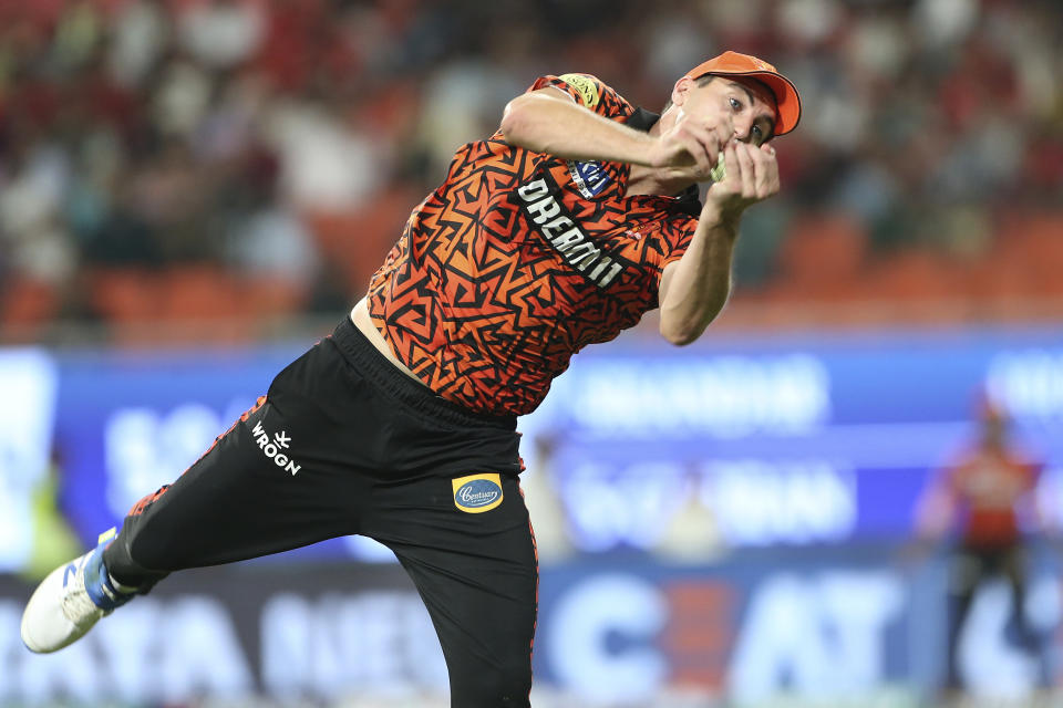 Sunrisers Hyderabad's captain Pat Cummins takes the catch to dismiss Punjab Kings' Sam Curran during the Indian Premier League cricket match between Sunrisers Hyderabad's and Punjab Kings in Mohali, India, Tuesday, April . 9, 2024.(AP Photo/Surjeet Yadav)