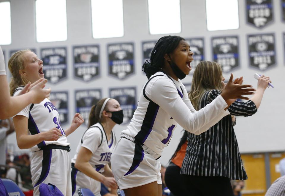 Mar. 20, 2021; Gilbert, Arizona, USA; Millennium's bench erupts after a three pointer against Flowing Wells during the 5A State Championship game at Mesquite High School. Mandatory Credit: Patrick Breen-Arizona Republic