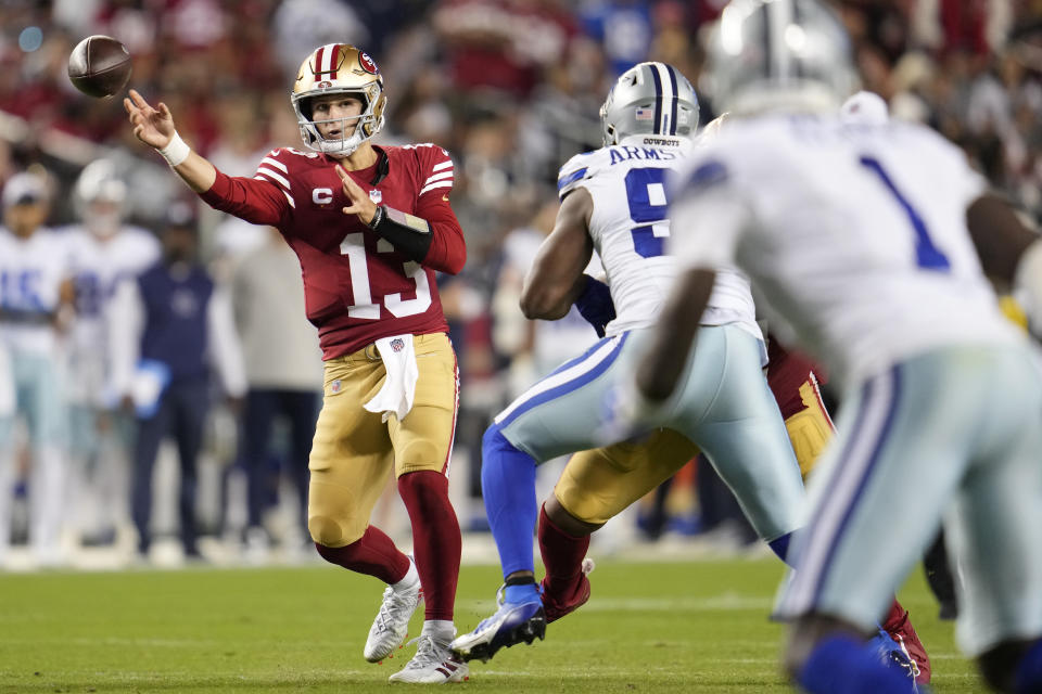 San Francisco 49ers quarterback Brock Purdy (13) passes against the Dallas Cowboys during the second half of an NFL football game in Santa Clara, Calif., Sunday, Oct. 8, 2023. (AP Photo/Godofredo A. Vásquez)