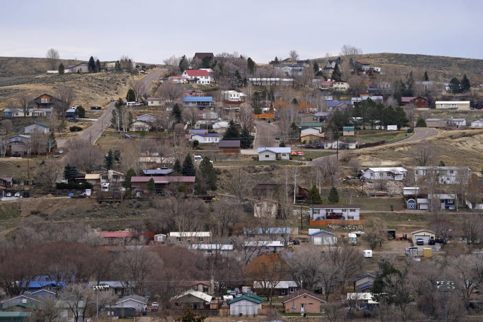 Homes line streets in the town of Craig, Colo., Friday, Nov. 19, 2021. The town in northwest Colorado is losing its coal plant, and residents fear it is the beginning of the end for their community. (AP Photo/Rick Bowmer)