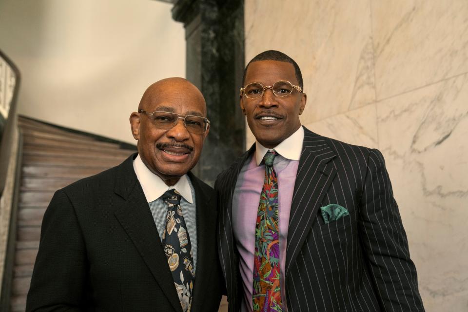 Willie E. Gary (left) and Jamie Foxx on the set of "The Burial." The Amazon Prime Video movie features Foxx as Gary, a still-practicing attorney who against great odds won a $500 million settlement in 1995 for his client, Jeremiah O'Keefe, played by Tommy Lee Jones.