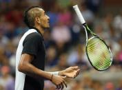 Nick Kyrgios tosses his racket while playing against Andy Murray during their US Open match at the USTA Billie Jean King National Center on September 1, 2015