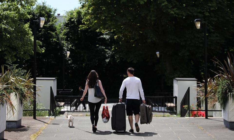 Residents leave their homes on the Camden estate.