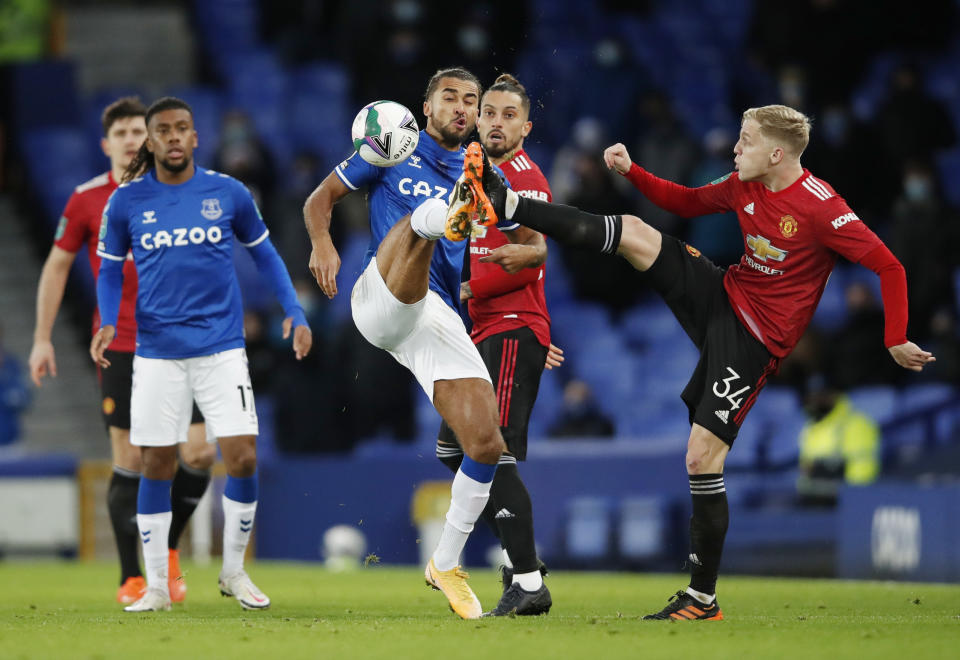 Manchester United's Donny van de Beek (left) in action with Everton's Dominic Calvert-Lewin.